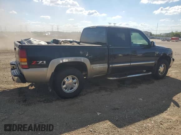 2002 GMC Sierra 1500 SLE with VIN 2GTEK19T721204899, listed as a Copart auction lot 70767695 with Not provided miles and Salvage title. Bid and sale history available at DreamBid. Image 3.