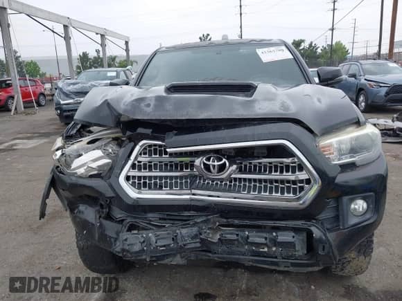 2017 Toyota Tacoma SR5 with VIN 3TMAZ5CN3HM026387, listed as a IAAI auction lot 42362780 with 216,739 mi miles and . Bid and sale history available at DreamBid. Image 12.