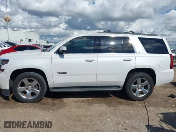 2017 Chevrolet Tahoe LT with VIN 1GNSCBKC1HR253068, listed as a IAAI auction lot 43275624 with 139,930 mi miles and . Bid and sale history available at DreamBid. Image 13.