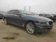 2016 BMW 7 Series 750i xDrive with VIN WBA7F2C52GG417795, listed as a Copart auction lot 51043725 with Not provided miles and Salvage title. Bid and sale history available at DreamBid. Image 4.