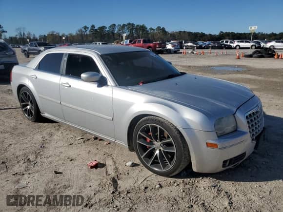 2005 Chrysler 300 Touring с VIN 2C3JA53G45H131463, выставлен на аукционе Copart как лот 44617125 с пробегом 70 318 миль миль и Списание • Salvage title. История ставок и продаж доступна на DreamBid. Изображение 4.