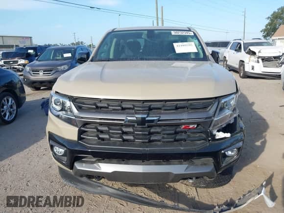 2022 Chevrolet Colorado 2WD Z71 z VIN 1GCGSDEN9N1332637, wystawiony jako IAAI lot #42109595 z przebiegiem 2 740 mil mil oraz . Historia ofert i sprzedaży dostępna na DreamBid. Obrazek 12.