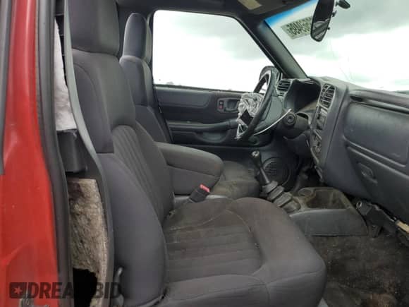 2003 Chevrolet S-10 LS с VIN 1GCCS14H138153358, выставлен на аукционе Copart как лот 63569495 с пробегом Не указан миль и Списание • Salvage title. История ставок и продаж доступна на DreamBid. Изображение 10.