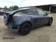 2023 Tesla Model Y Long Range с VIN 7SAYGDEE0PA156044, выставлен на аукционе Copart как лот 63698664 с пробегом 17 274 миль миль и Списание • Salvage title. История ставок и продаж доступна на DreamBid. Изображение 3.