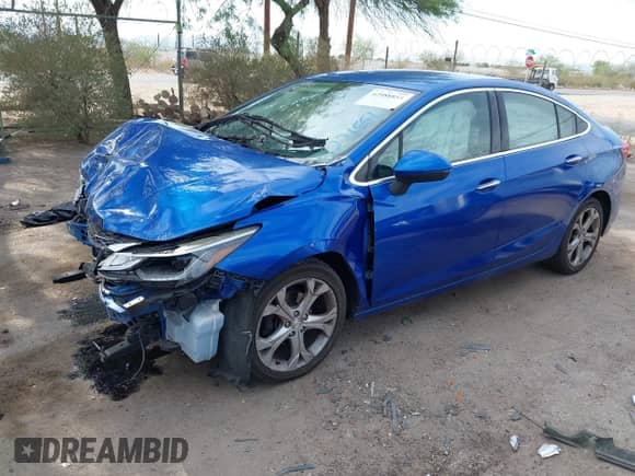 2016 Chevrolet Cruze Premier z VIN 1G1BG5SM3G7271551, wystawiony jako IAAI lot #42988853 z przebiegiem 87 746 mil mil oraz . Historia ofert i sprzedaży dostępna na DreamBid. Obrazek 18.