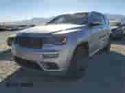 2018 Jeep Grand Cherokee High Altitude z VIN 1C4RJFCM7JC374112, wystawiony jako Copart lot #63704372 z przebiegiem 74 499 mil mil oraz . Historia ofert i sprzedaży dostępna na DreamBid. Obrazek 2.