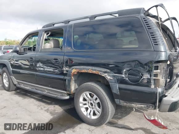 2003 Chevrolet Suburban Z71 with VIN 3GNFK16Z73G150095, listed as a IAAI auction lot 43209119 with 155,321 mi miles and . Bid and sale history available at DreamBid. Image 12.