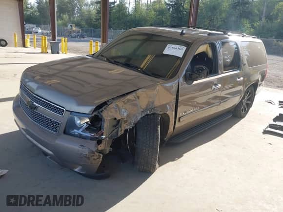 2007 Chevrolet Suburban LTZ with VIN 1GNFK16367J321452, listed as a IAAI auction lot 42866365 with 184,333 mi miles and . Bid and sale history available at DreamBid. Image 2.