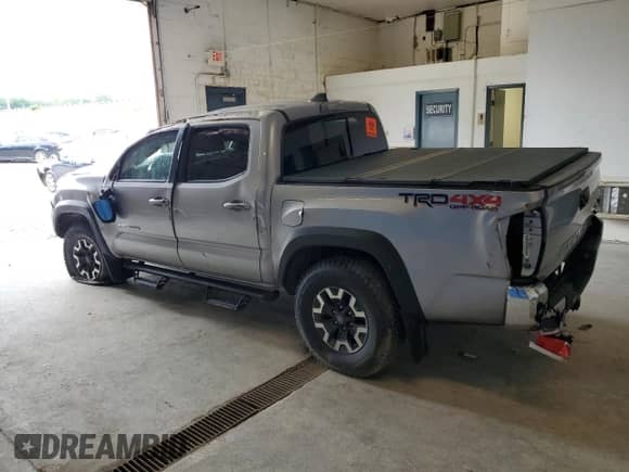 2021 Toyota Tacoma SR with VIN 3TMCZ5AN7MM383321, listed as a Copart auction lot 64829455 with Not provided miles and Clean title. Bid and sale history available at DreamBid. Image 2.