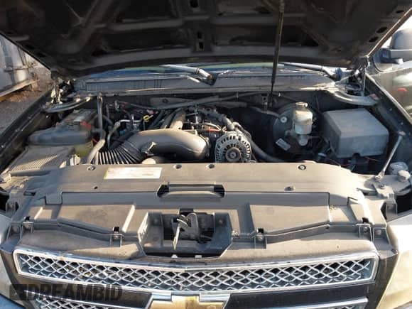 2007 Chevrolet Suburban LT z VIN 3GNFK16307G101922, wystawiony jako IAAI lot #43320570 z przebiegiem 172 591 mil mil oraz . Historia ofert i sprzedaży dostępna na DreamBid. Obrazek 10.