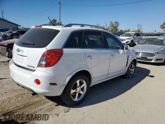 2013 Chevrolet Captiva Sport LT with VIN 3GNFL3EK3DS519918, listed as a Copart auction lot 76310344 with 128,423 mi miles and Salvage title. Bid and sale history available at DreamBid. Image 3.