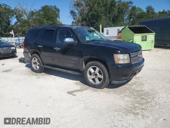 2011 Chevrolet Tahoe LS with VIN 1GNSCAE01BR179105, listed as a Copart auction lot 86249295 with 233,418 mi miles and Salvage title. Bid and sale history available at DreamBid. Image 4.