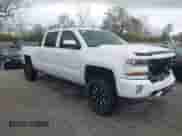 2016 Chevrolet Silverado 1500 LT with VIN 3GCUKREC0GG363536, listed as a IAAI auction lot 42064592 with 99,881 mi miles and . Bid and sale history available at DreamBid. Image 1.