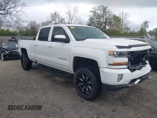 2016 Chevrolet Silverado 1500 LT with VIN 3GCUKREC0GG363536, listed as a IAAI auction lot 42064592 with 99,881 mi miles and . Bid and sale history available at DreamBid. Image 1.