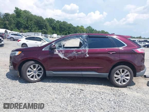 2019 Ford Edge Titanium with VIN 2FMPK3K93KBB40174, listed as a IAAI auction lot 43061291 with 198,000 mi miles and . Bid and sale history available at DreamBid. Image 14.