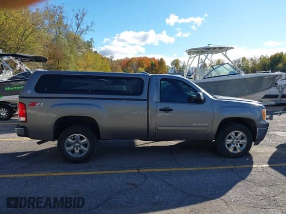 2013 GMC Sierra 1500 SLE z VIN 1GTN2VE08DZ118952, wystawiony jako IAAI lot #43537156 z przebiegiem 338 901 mil mil oraz . Historia ofert i sprzedaży dostępna na DreamBid. Obrazek 13.