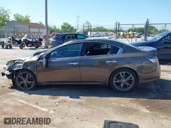 2014 Nissan Maxima SV z VIN 1N4AA5AP9EC441275, wystawiony jako IAAI lot #42586862 z przebiegiem Nie podano mil oraz . Historia ofert i sprzedaży dostępna na DreamBid. Obrazek 14.