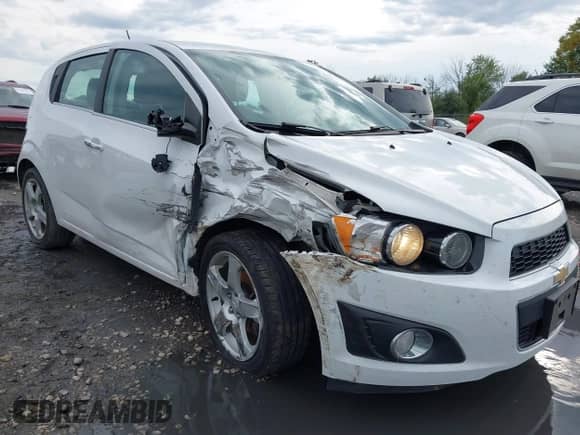 2015 Chevrolet Sonic LTZ with VIN 1G1JE6SB9F4193315, listed as a IAAI auction lot 43279436 with 100,413 mi miles and . Bid and sale history available at DreamBid. Image 6.