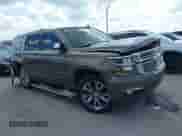 2015 Chevrolet Tahoe LTZ with VIN 1GNSCCKC1FR599320, listed as a IAAI auction lot 43093837 with 124,751 mi miles and . Bid and sale history available at DreamBid. Image 1.