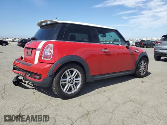 2011 MINI Hardtop S with VIN WMWSV3C50BTY12562, listed as a Copart auction lot 61183425 with 125,126 mi miles and Salvage title. Bid and sale history available at DreamBid. Image 3.