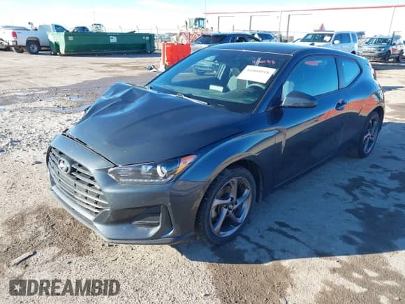 2020 Hyundai Veloster 2.0 with VIN KMHTG6AF5LU027945, listed as a IAAI auction lot 41004918 with 119,015 mi miles and . Bid and sale history available at DreamBid. Image 2.