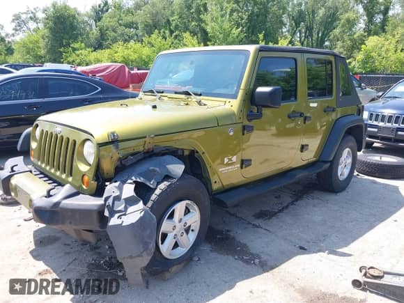 2007 Jeep Wrangler Unlimited X с VIN 1J4GA39177L148500, выставлен на аукционе IAAI как лот 42439607 с пробегом 225 323 миль миль и . История ставок и продаж доступна на DreamBid. Изображение 18.