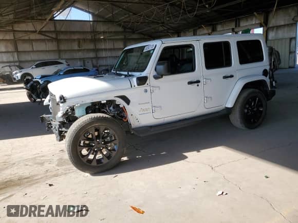 2023 Jeep Wrangler Sahara z VIN 1C4JJXP65PW540231, wystawiony jako Copart lot #80362135 z przebiegiem 23 163 mil mil oraz Szkoda całkowita • Salvage title. Historia ofert i sprzedaży dostępna na DreamBid. Obrazek 1.