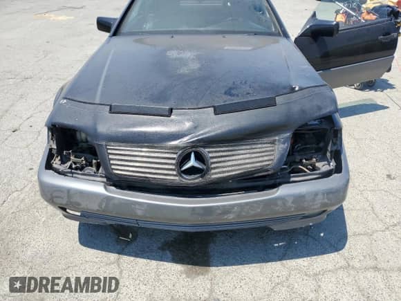 1992 Mercedes-Benz 500 z VIN WDBFA66E0NF040854, wystawiony jako Copart lot #63866875 z przebiegiem 144 606 mil mil oraz Szkoda całkowita • Salvage title. Historia ofert i sprzedaży dostępna na DreamBid. Obrazek 11.