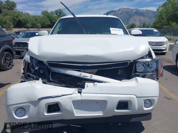 2007 Chevrolet Suburban LTZ with VIN 1GNFK163X7J305481, listed as a IAAI auction lot 42402983 with 147,778 mi miles and . Bid and sale history available at DreamBid. Image 12.