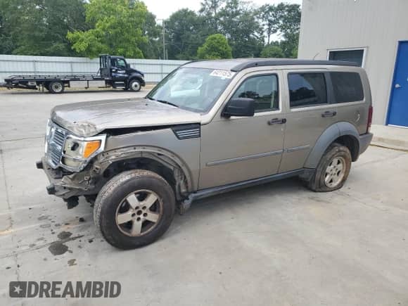 2007 Dodge Nitro SXT with VIN 1D8GT28K77W619372, listed as a Copart auction lot 64211575 with 241,013 mi miles and Salvage title. Bid and sale history available at DreamBid. Image 1.