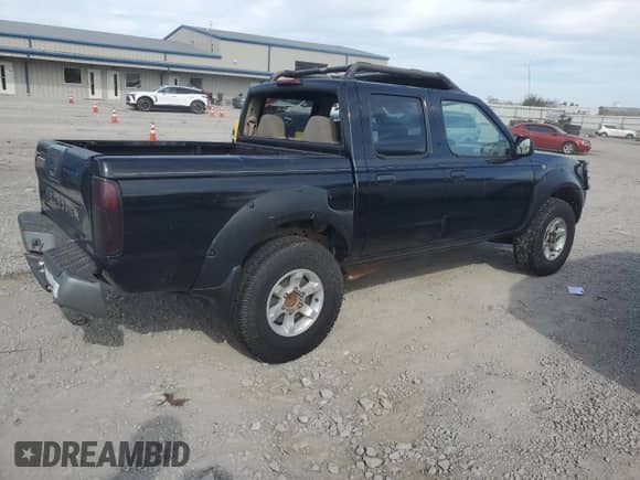 2001 Nissan Frontier SE с VIN 1N6ED27T01C313522, выставлен на аукционе Copart как лот 87118435 с пробегом 248 075 миль миль и Чистый • Clean title. История ставок и продаж доступна на DreamBid. Изображение 3.