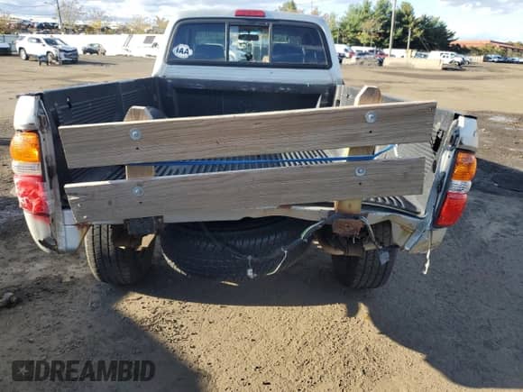 2003 Toyota Tacoma z VIN 5TEWM72N03Z172176, wystawiony jako Copart lot #87448195 z przebiegiem 276 730 mil mil oraz Szkoda całkowita • Salvage title. Historia ofert i sprzedaży dostępna na DreamBid. Obrazek 6.