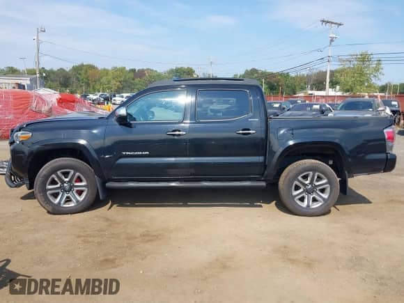 2016 Toyota Tacoma Limited with VIN 3TMGZ5AN3GM006457, listed as a IAAI auction lot 43285623 with 65,924 mi miles and . Bid and sale history available at DreamBid. Image 14.
