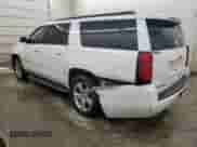 2015 Chevrolet Suburban LT with VIN 1GNSKJKC6FR635316, listed as a Copart auction lot 65336185 with 217,006 mi miles and Salvage title. Bid and sale history available at DreamBid. Image 2.