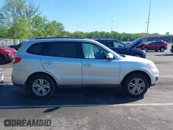 2012 Hyundai Santa Fe Limited с VIN 5XYZKDAG7CG132501, выставлен на аукционе IAAI как лот 42212243 с пробегом 110 570 миль миль и . История ставок и продаж доступна на DreamBid. Изображение 13.