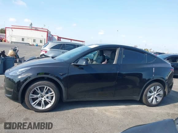 2023 Tesla Model Y Long Range z VIN 7SAYGAEE9PF851348, wystawiony jako IAAI lot #43167064 z przebiegiem Nie podano mil oraz . Historia ofert i sprzedaży dostępna na DreamBid. Obrazek 14.