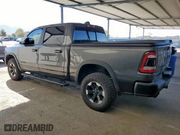 2019 Ram 1500 Rebel z VIN 1C6SRFLT3KN598363, wystawiony jako Copart lot #80063005 z przebiegiem 52 624 mil mil oraz Szkoda całkowita • Salvage title. Historia ofert i sprzedaży dostępna na DreamBid. Obrazek 2.