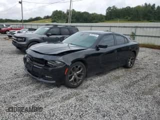 2015 Dodge Charger SXT with VIN 2C3CDXHG1FH901785, listed as a Copart auction lot 84014815 with 137,516 mi miles and Salvage title. Bid and sale history available at DreamBid. Image 1.