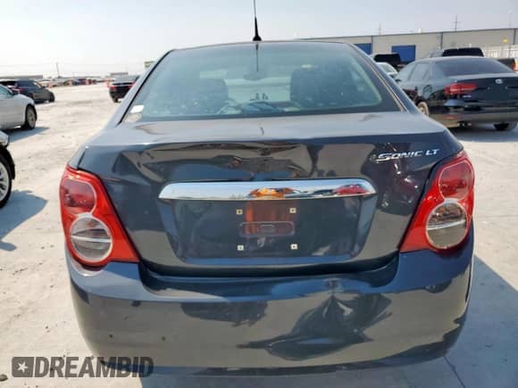 2012 Chevrolet Sonic LT с VIN 1G1JC5SH5C4184076, выставлен на аукционе Copart как лот 81641565 с пробегом 162 857 миль миль и Чистый • Clean title. История ставок и продаж доступна на DreamBid. Изображение 6.