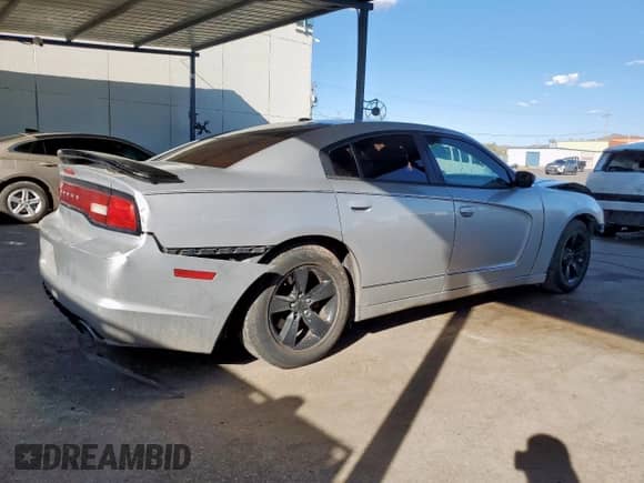 2012 Dodge Charger SE with VIN 2C3CDXBG8CH287306, listed as a Copart auction lot 84903545 with 203,624 mi miles and Salvage title. Bid and sale history available at DreamBid. Image 3.