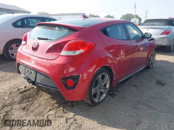 2013 Hyundai Veloster Turbo с VIN KMHTC6AEXDU138141, выставлен на аукционе IAAI как лот 42401259 с пробегом 150 974 миль миль и . История ставок и продаж доступна на DreamBid. Изображение 4.