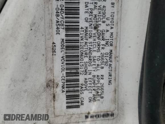 1992 Toyota Camry z VIN 4T1VK12E0NU015172, wystawiony jako Copart lot #58974095 z przebiegiem 210 163 mil mil oraz Szkoda całkowita • Salvage title. Historia ofert i sprzedaży dostępna na DreamBid. Obrazek 12.