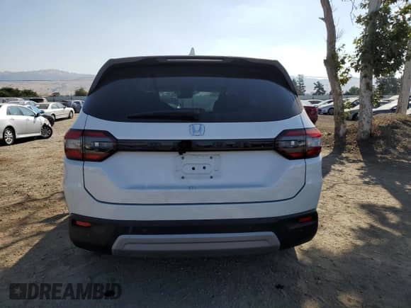 2024 Honda Pilot EX-L с VIN 5FNYG2H46RB005932, выставлен на аукционе Copart как лот 62597785 с пробегом 28 099 миль миль и Списание • Salvage title. История ставок и продаж доступна на DreamBid. Изображение 6.