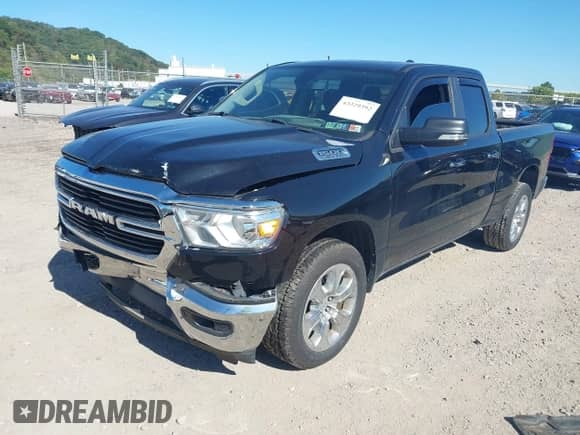 2020 Ram 1500 Big Horn z VIN 1C6SRFBT2LN214446, wystawiony jako IAAI lot #43329392 z przebiegiem 57 501 mil mil oraz . Historia ofert i sprzedaży dostępna na DreamBid. Obrazek 2.