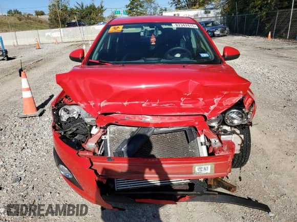 2015 Chevrolet Sonic LTZ with VIN 1G1JE5SB1F4201935, listed as a Copart auction lot 82342415 with 111,922 mi miles and Salvage title. Bid and sale history available at DreamBid. Image 5.