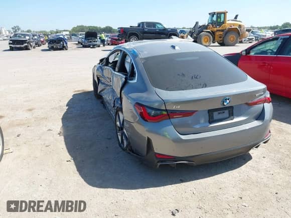 2024 BMW i4 eDrive35 with VIN WBY43AW09RFS60623, listed as a IAAI auction lot 42713384 with 12,857 mi miles and . Bid and sale history available at DreamBid. Image 3.