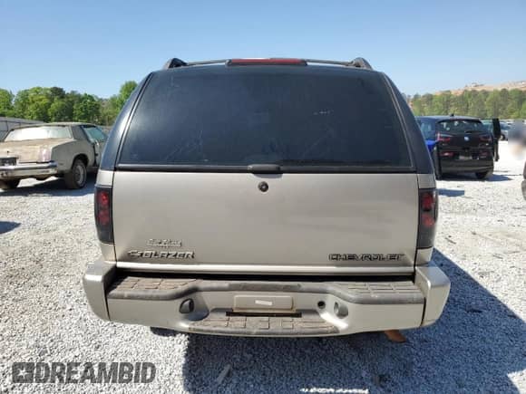 2001 Chevrolet Blazer LT с VIN 1GNCS13WX1K193588, выставлен на аукционе Copart как лот 52817665 с пробегом 98 109 миль миль и Списание • Salvage title. История ставок и продаж доступна на DreamBid. Изображение 6.