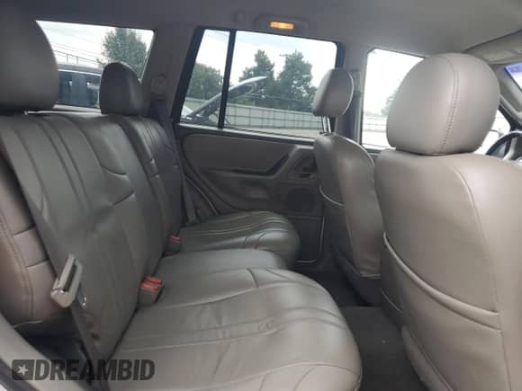 2002 Jeep Grand Cherokee Sport with VIN 1J4GW38S12C236897, listed as a Copart auction lot 61746635 with 141,693 mi miles and Clean title. Bid and sale history available at DreamBid. Image 11.