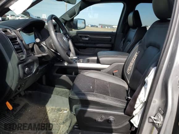 2024 Ram 1500 Rebel z VIN 1C6SRFLT2RN211523, wystawiony jako Copart lot #68870655 z przebiegiem 24 028 mil mil oraz Szkoda całkowita • Salvage title. Historia ofert i sprzedaży dostępna na DreamBid. Obrazek 7.