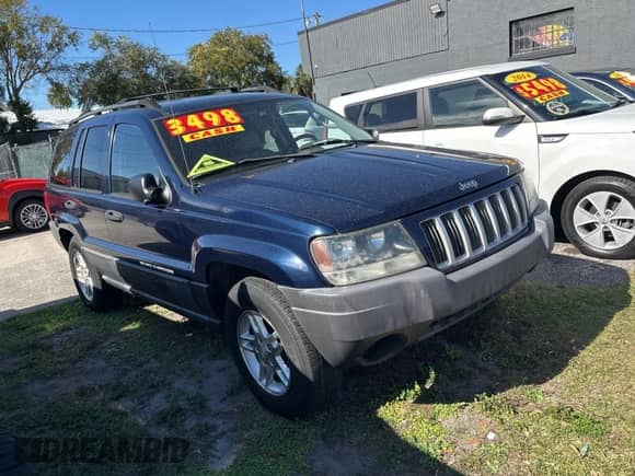 2004 Jeep Grand Cherokee Laredo z VIN 1J4GX48N24C436753, wystawiony jako Copart lot #88142905 z przebiegiem 114 022 mil mil oraz Czysty tytuł • Clean title. Historia ofert i sprzedaży dostępna na DreamBid. Obrazek 1.